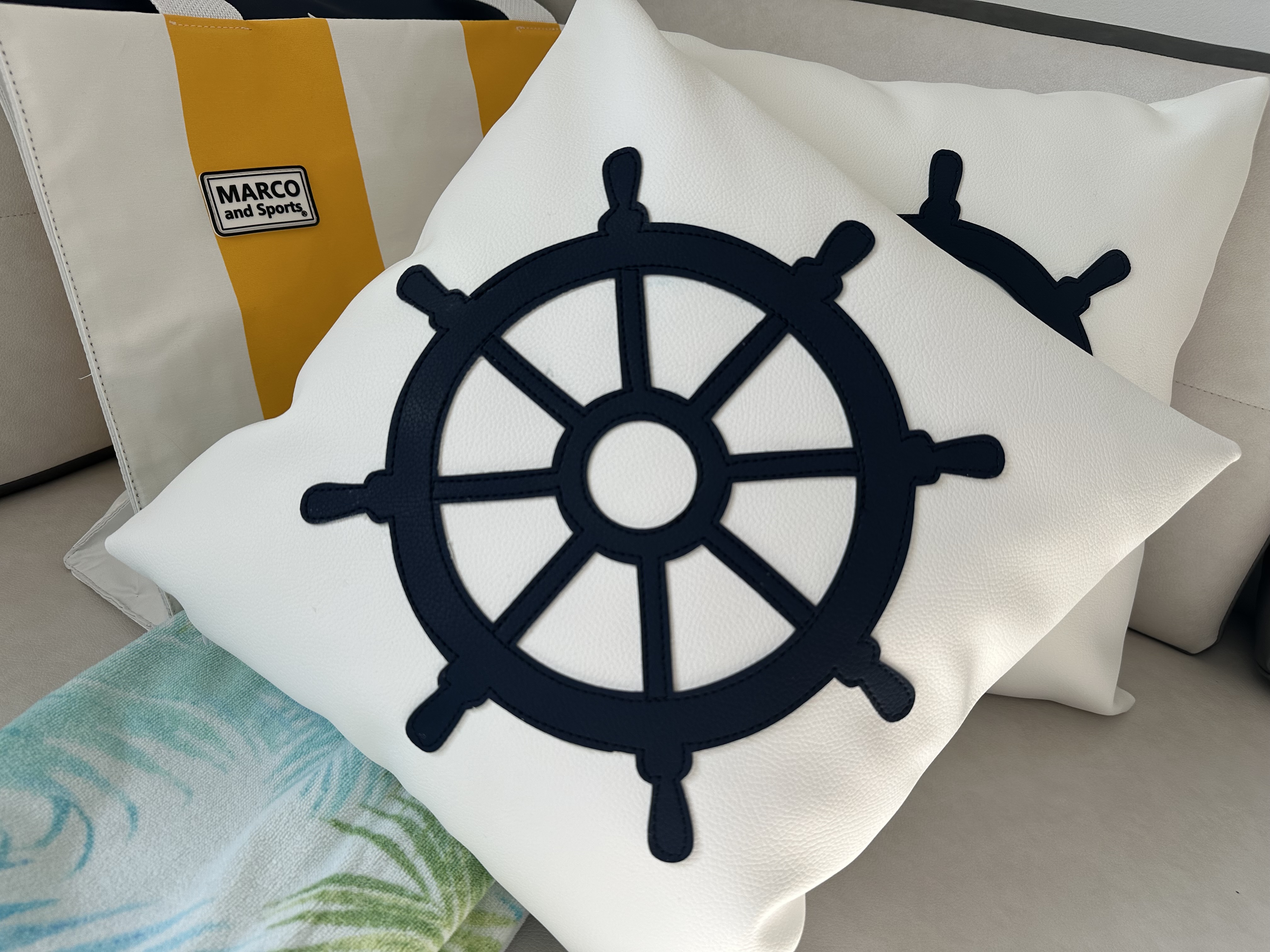 Nautical helm wheel marine grade vinyl throw pillow perfect for yacht interior decor